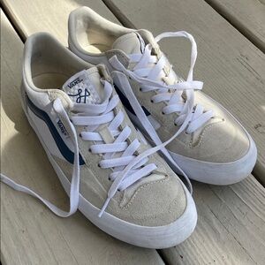 Vans White Low-Top Sneakers with Navy Side Stripe